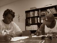 Two dropouts studying for the GED